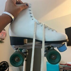 Vintage White Roller Skates with Teal Wheels
